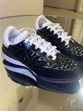 CHANEL Black and White Quilted Leather Women’s Sneakers with Logo